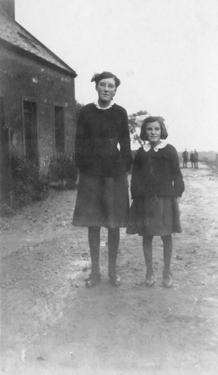 Williamina Sutherland outside Cromarty Mains Farm Cottages