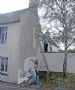 Phoebe and Graham Fox painting their new house - Sun Court